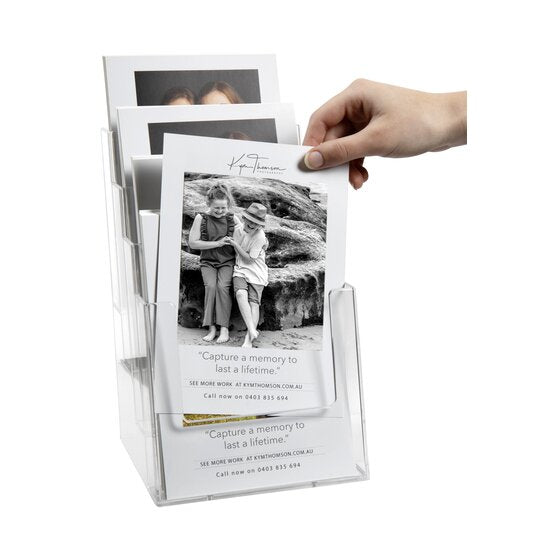 Hand taking a photo card from the Esselte four tier A5 holder, cards standing in each of the rear pockets