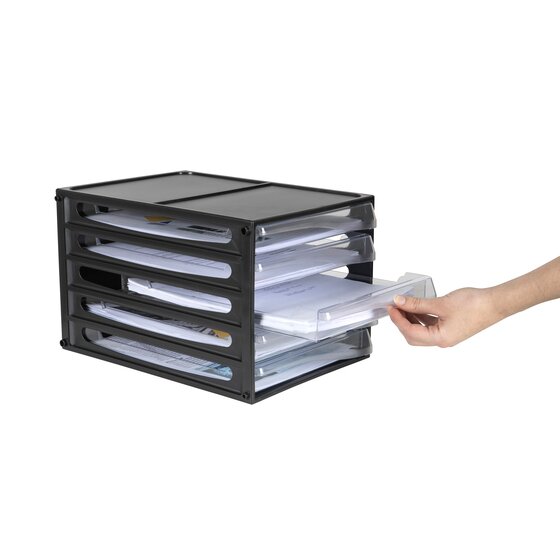 A hand sliding a paper-filled clear drawer out of the black five drawer desktop unit