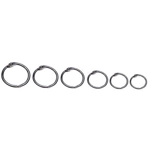 Six silver Esselte hinged rings in a row from largest to smallest, a range shot showing the different ring sizes