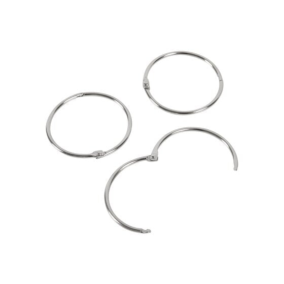 Three silver Esselte 50mm hinged rings, two closed and one swung open on its hinge