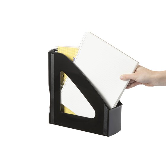 Hand lifting a notebook out of a black Nouveau magazine file holding papers and notebooks