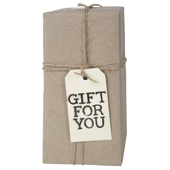 Buff tag printed GIFT FOR YOU tied with twine around a box wrapped in brown kraft paper