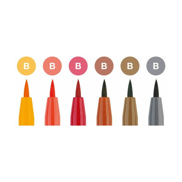 Close-up of Faber-Castell Pitt Artist Pen brush tips and colour labels for shonen manga set including phthalo blue and purple violet