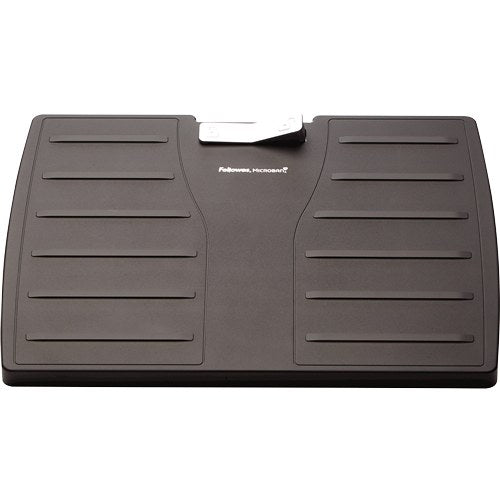 Top view of the black footrest with ribbed grip strips either side and Fellowes Microban printed below the silver tab