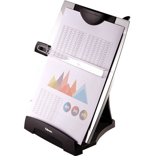 Office Suites copyholder holding an A4 page of tables and coloured charts under its top clip, line guide across the page