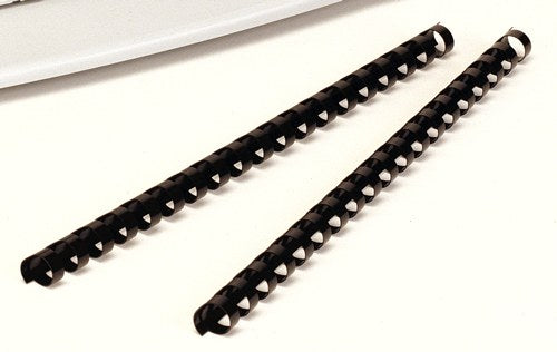 Two black Fellowes plastic binding combs lying on a white desk, loops facing up, one comb slightly behind the other