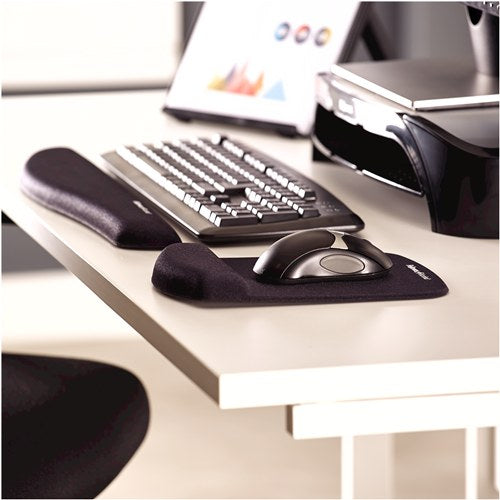 Black PlushTouch keyboard rest and mouse pad on a white desk beside a keyboard, mouse and printer