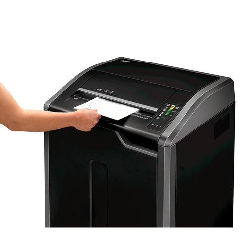 Hand feeding a page into the wide entry of the Powershred 485Ci