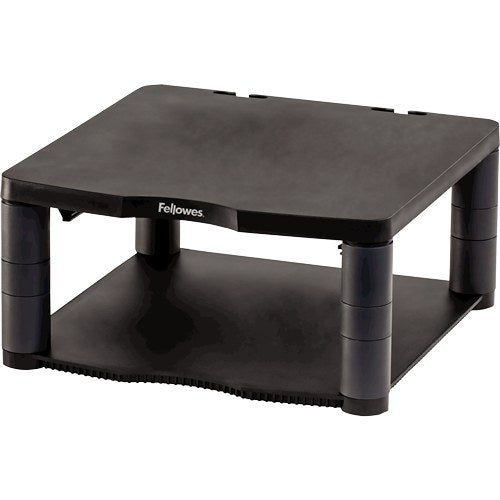 Empty graphite premium monitor riser with four stacking column legs, the Fellowes name on the front and a lower shelf