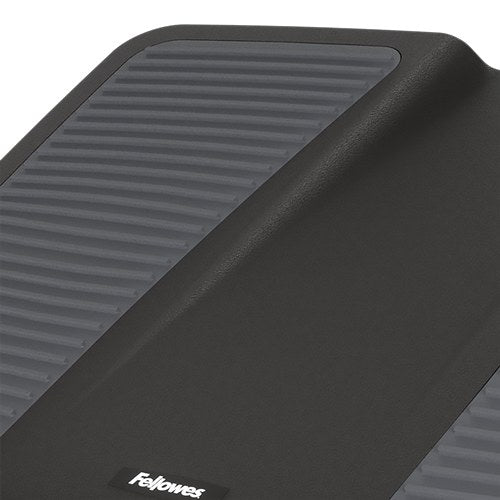Close-up of a grey ribbed foot pad and the Fellowes logo on the black Ultimate foot support platform