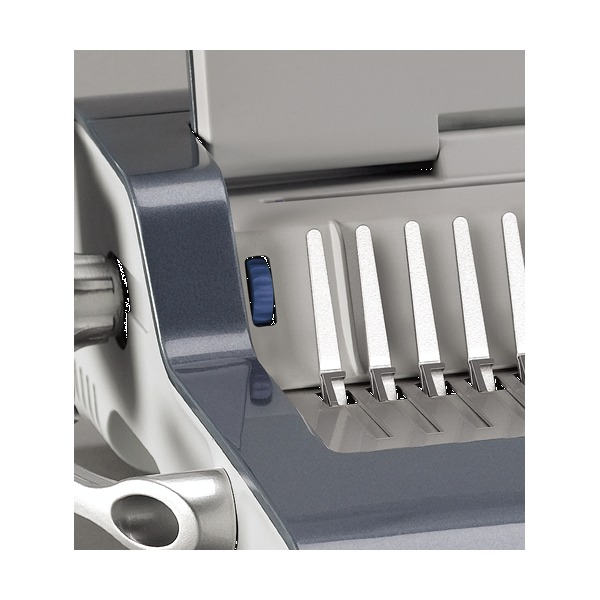 Close-up of the Quasar-E 500 control area with the blue switch beside the white comb teeth