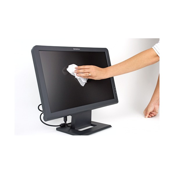 Hand wiping the screen of a black flat panel monitor on a stand with a white cleaning wipe