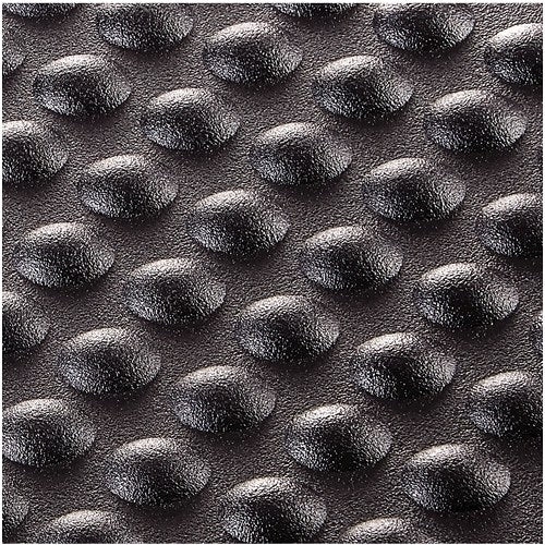 Close-up of the round bump texture on the graphite footrest platform
