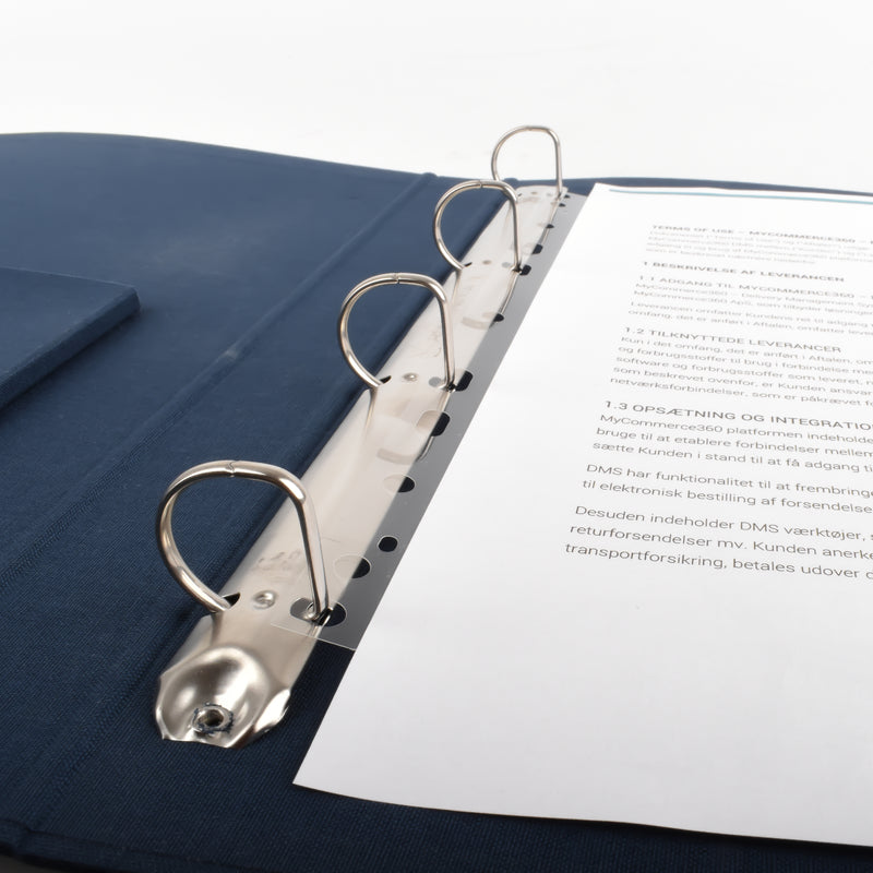 Unpunched document held in an open ring binder by a clear 3L filing strip fitted over the binder rings