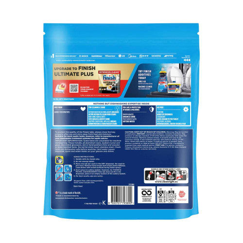 Close-up of a single Finish Power Essential Lemon Sparkle wrapper-free dishwashing tablet showing Powerball centre