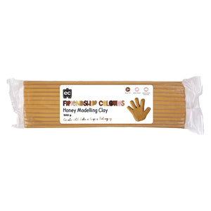 Packaged Friendship Colours Honey Modelling Clay 500g shown on a clean white background. The image clearly displays the honey coloured clay block, product branding, non toxic formulation and educational suitability for classroom and home use.