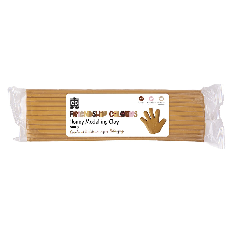 Packaged Friendship Colours Honey Modelling Clay 500g shown on a clean white background. The image clearly displays the honey coloured clay block, product branding, non toxic formulation and educational suitability for classroom and home use.