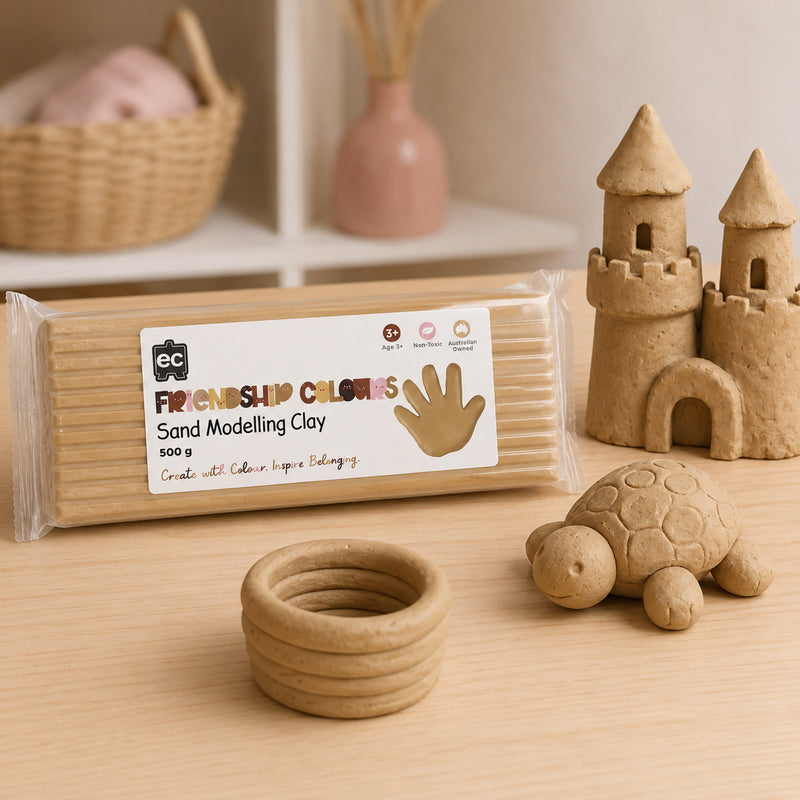 Friendship Colours Sand Modelling Clay 500g presented with detailed clay sculptures including a castle, turtle and decorative bowl. The image demonstrates the clay's ability to hold shape while remaining soft and easy to manipulate for creative learning activities.
