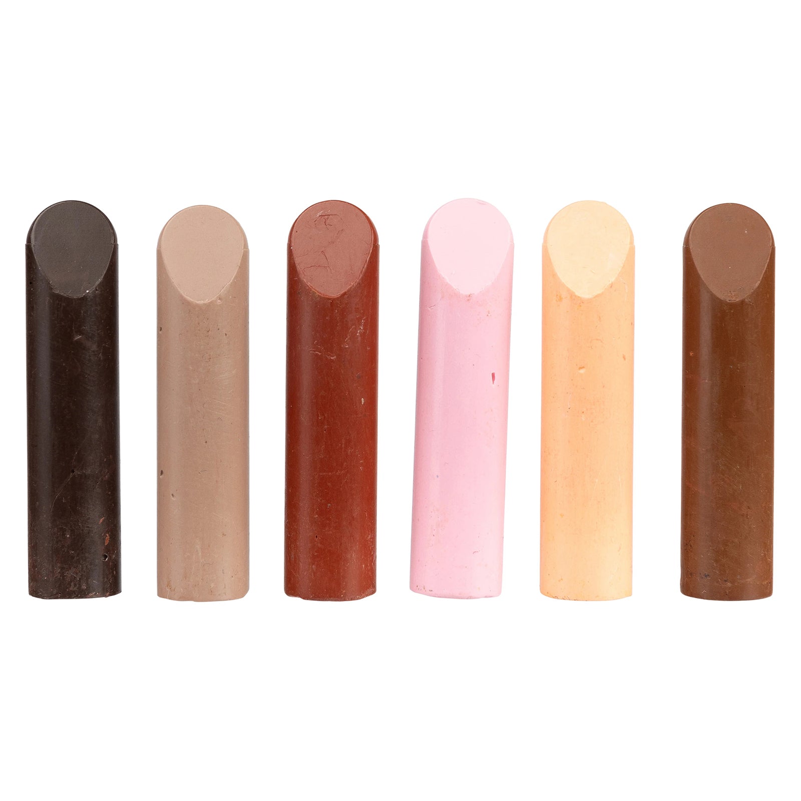 Product only image showing all six skin tone crayons lined up against a plain background. The colour range spans from deep brown to light peach, providing inclusive options for portrait and people based artwork.