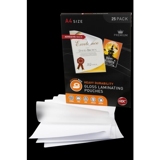 GBC A4 adhesive back laminating pouch box behind loose pouches with white backing sheets fanned out on a black background