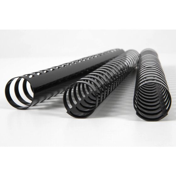 Three wide black GBC plastic binding combs lying on a white surface, the nearest showing its large open rings end on