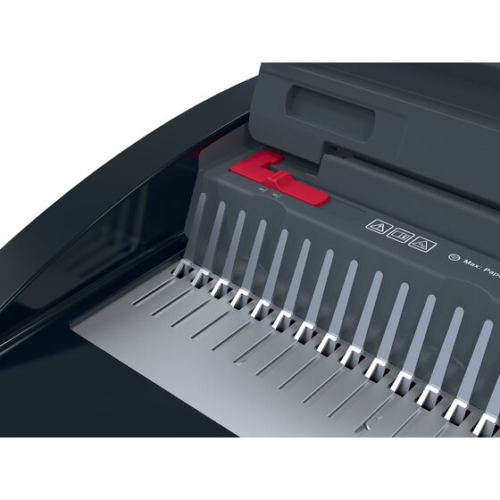 Close-up of the GBC CombBind CB20 punch area showing the row of punch pins and a red sliding paper guide