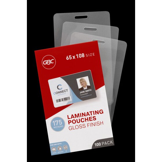 GBC 65 x 108 size laminating pouch box in front of three loose clear pouches, each with a slot near the top, on black