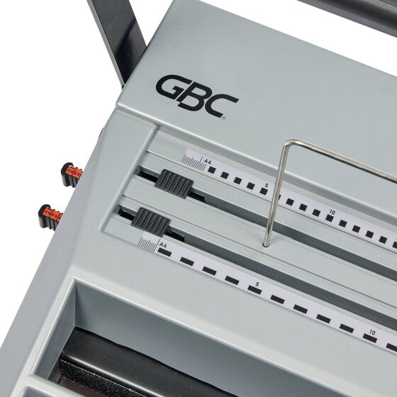 Top of the GBC MB20 showing the GBC logo and two paper guide sliders against A4 scale markings beside the paper rest