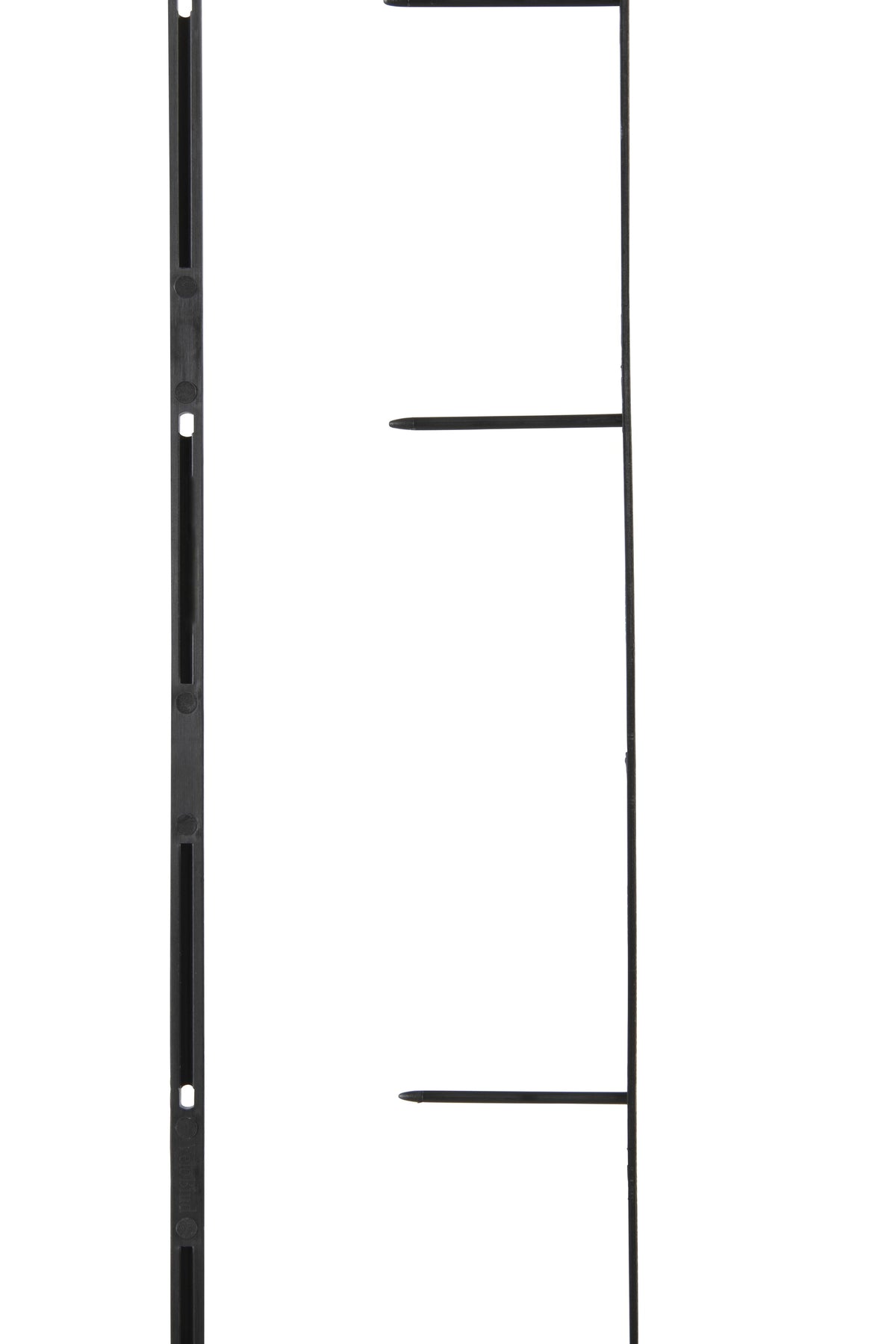 Close side view of a section of black GBC VeloBind strips, a slotted closing strip on the left and a pronged strip on the right with three of its prongs in frame, the strips running beyond the top and bottom edges
