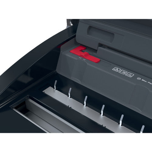 Close up of the GBC WireBind WB15 punch area showing the pins, red margin lever and safety symbols