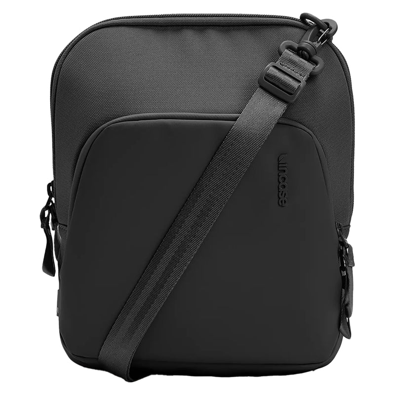 Front studio view of the Incase A.R.C. Crossbody Bag in black featuring the streamlined design, water resistant front panel, dual zippered compartments, adjustable shoulder strap and subtle Incase branding. The clean presentation emphasises the modern aesthetic and premium construction for everyday commuting and travel.