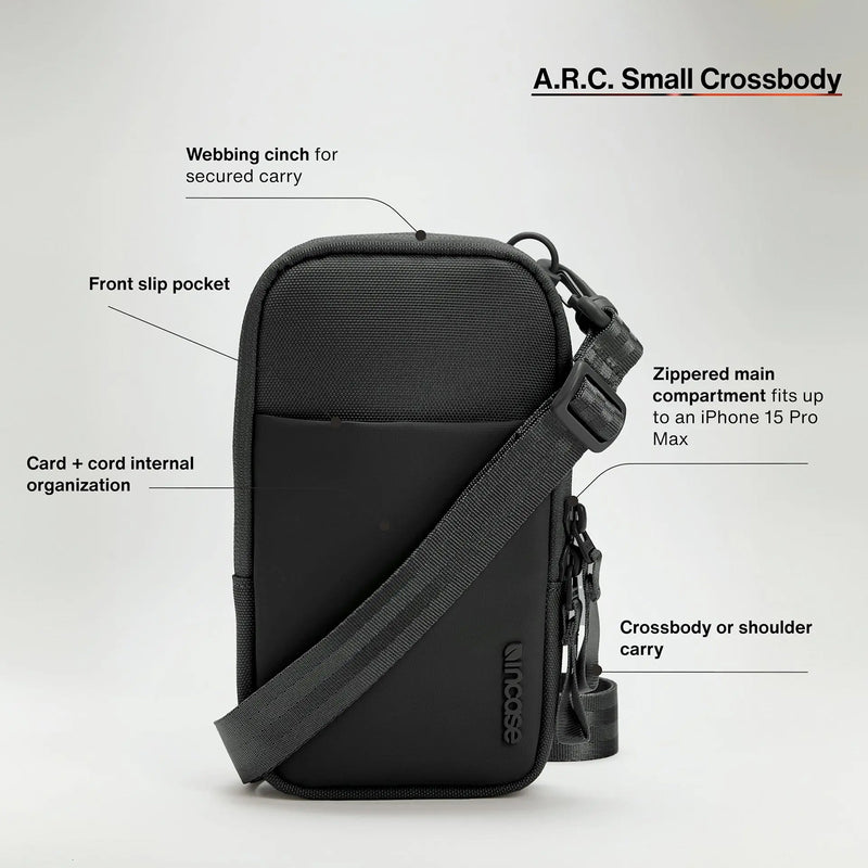 Product feature overview illustrating the front slip pocket, internal card organisation, adjustable shoulder strap, secure webbing cinch and zippered main compartment sized for large smartphones.