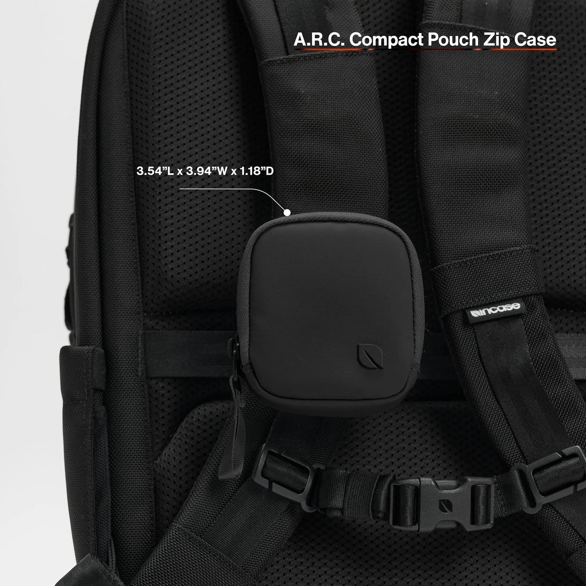 Black A.R.C. Compact Pouch clipped to a backpack shoulder strap, with the product name and dimensions printed over the image