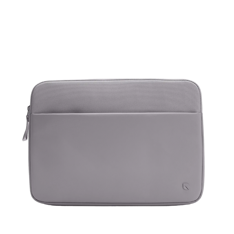 Incase A.R.C. Sleeve for 14-inch laptops in Gray, a soft grey with a lilac tone, front view showing the zippered front pocket, on a plain background