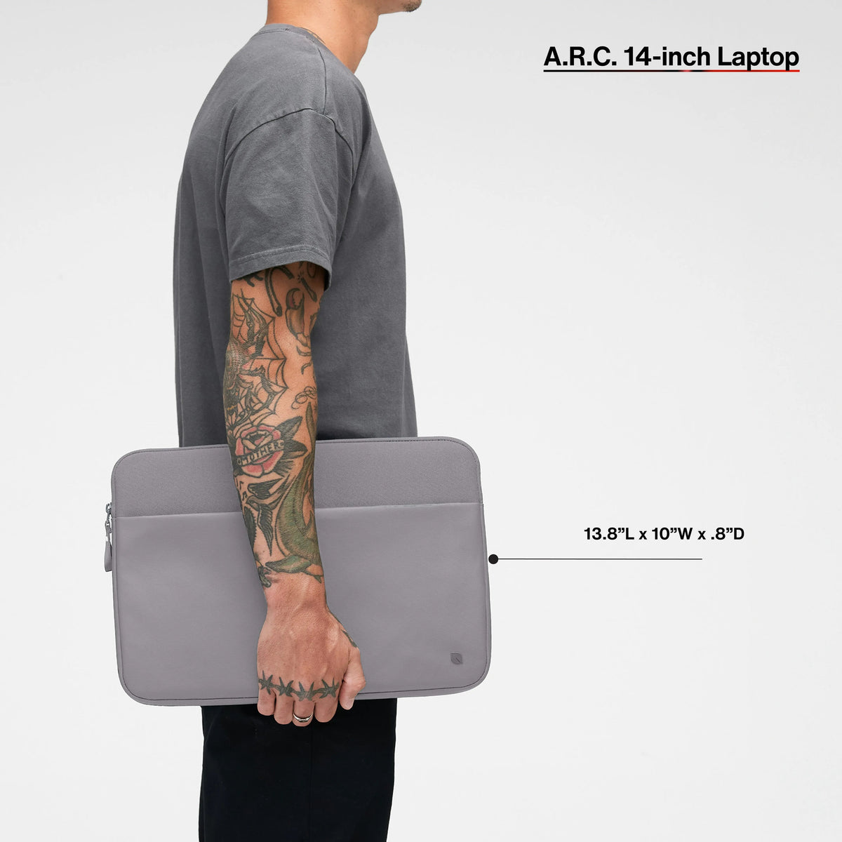 Gray A.R.C. 14-inch sleeve carried by a model, with the product name and dimensions printed over the image