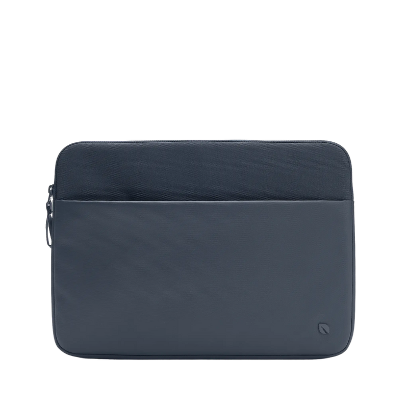 Incase A.R.C. Sleeve for 14-inch laptops in Navy, front view showing the zippered front pocket, on a plain background