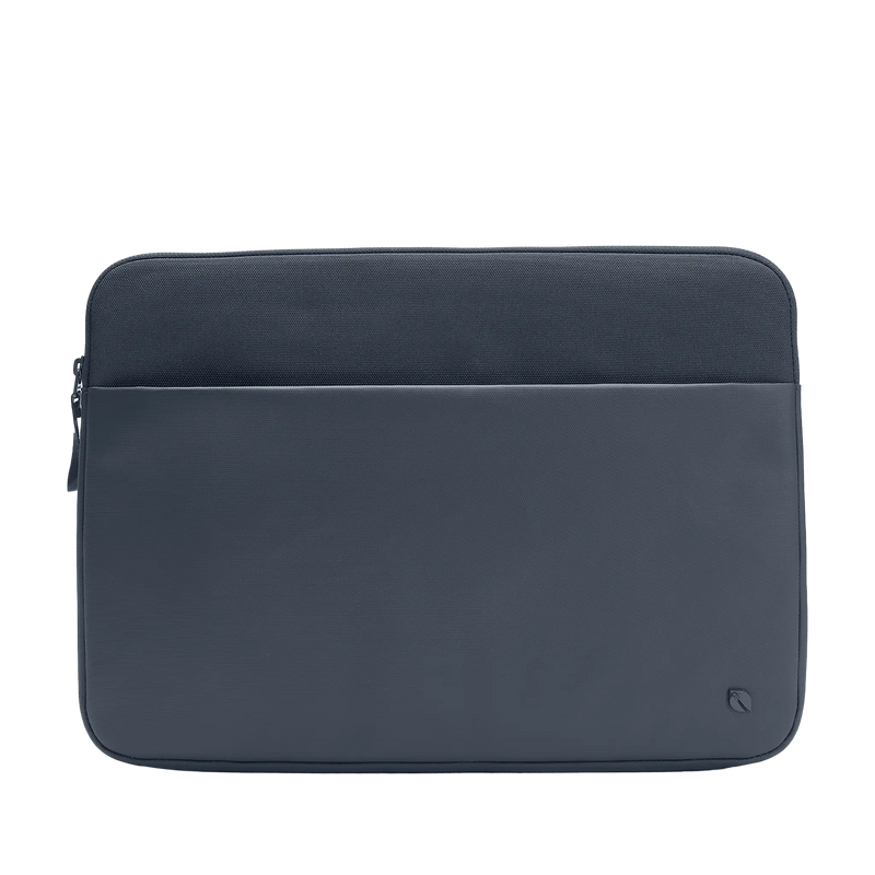 Incase A.R.C. Sleeve for 16-inch laptops in Navy, front view showing the zippered front pocket, on a plain background