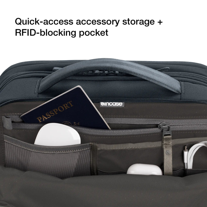 Open top pocket of the Incase A.R.C. Travel Pack holding a passport and earbuds, captioned Quick-access accessory storage and RFID-blocking pocket