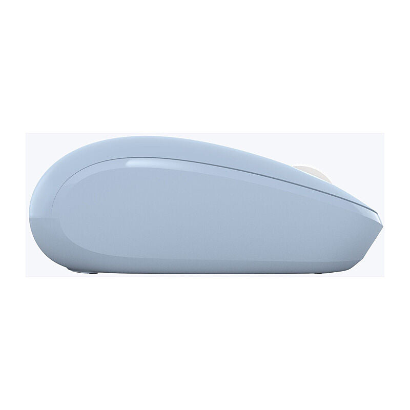 Incase Designed by Microsoft Bluetooth Mouse in Pastel Blue, side profile showing the low, rounded shape on a light grey background