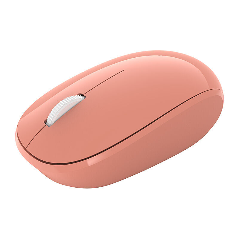 Incase Designed by Microsoft Bluetooth Mouse in Peach, three-quarter top view on a plain white background