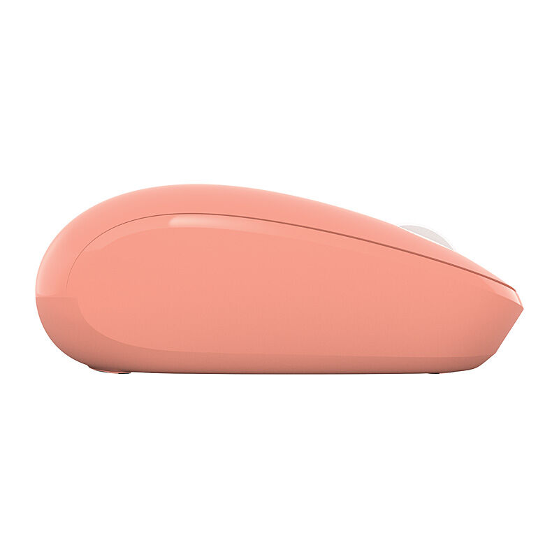 Incase Designed by Microsoft Bluetooth Mouse in Peach, side profile showing the low, rounded shape