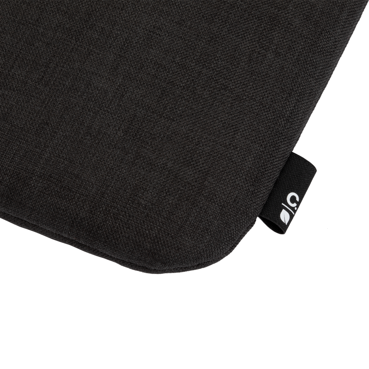 Incase Carry Zip Sleeve for 13-inch laptops in black, close-up of a corner with the Incase label on the very dark heathered fabric