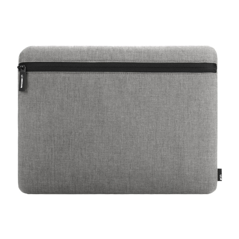 Incase Carry Zip Sleeve for 13-inch laptops in Cement Gray, front view with the zip running along the top of the sleeve