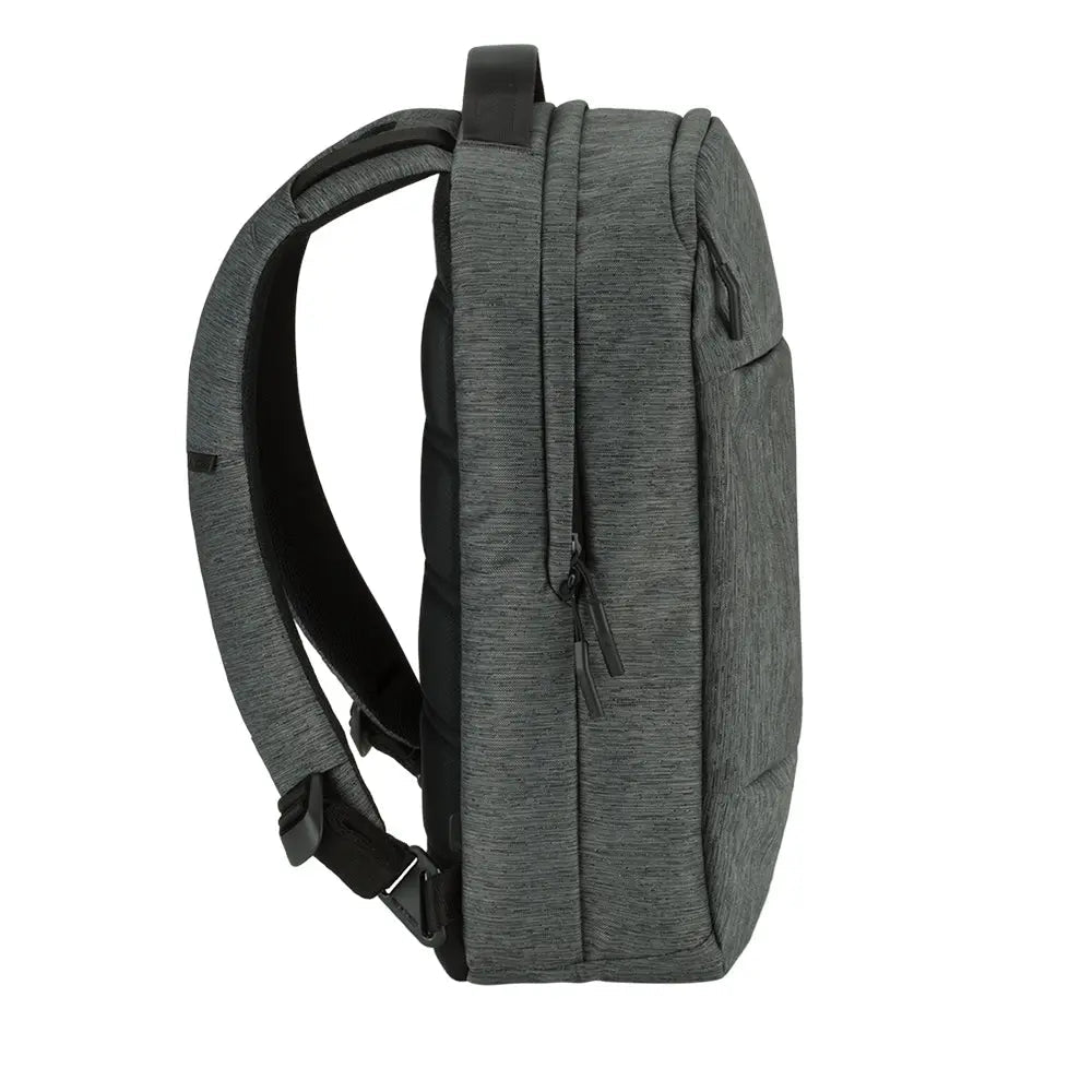 Incase City Compact Backpack in Heather Black, side three-quarter view showing a shoulder strap