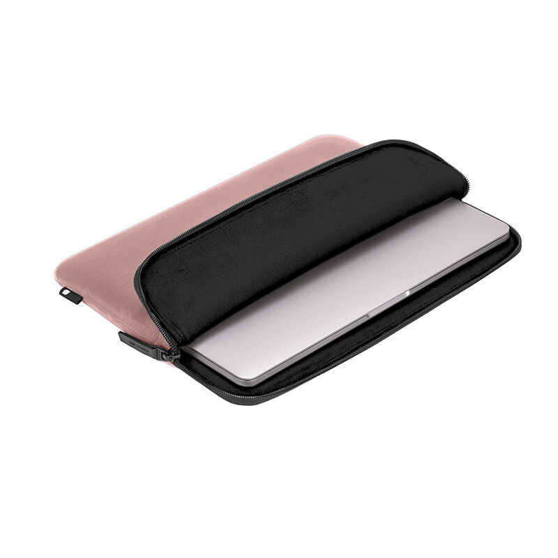 Aged Pink Incase Compact Sleeve open with a laptop partly inside, on a white background