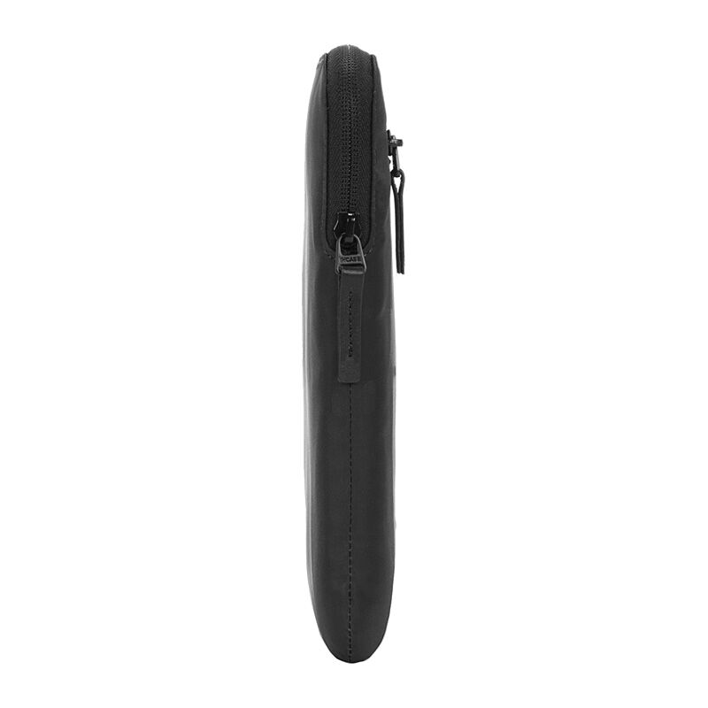 Black Incase Compact Sleeve in side profile on a plain white background, showing its slim depth