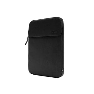 Incase Crosstown Sleeve for 14-inch laptops in Black, standing upright at a three-quarter angle on a plain white background