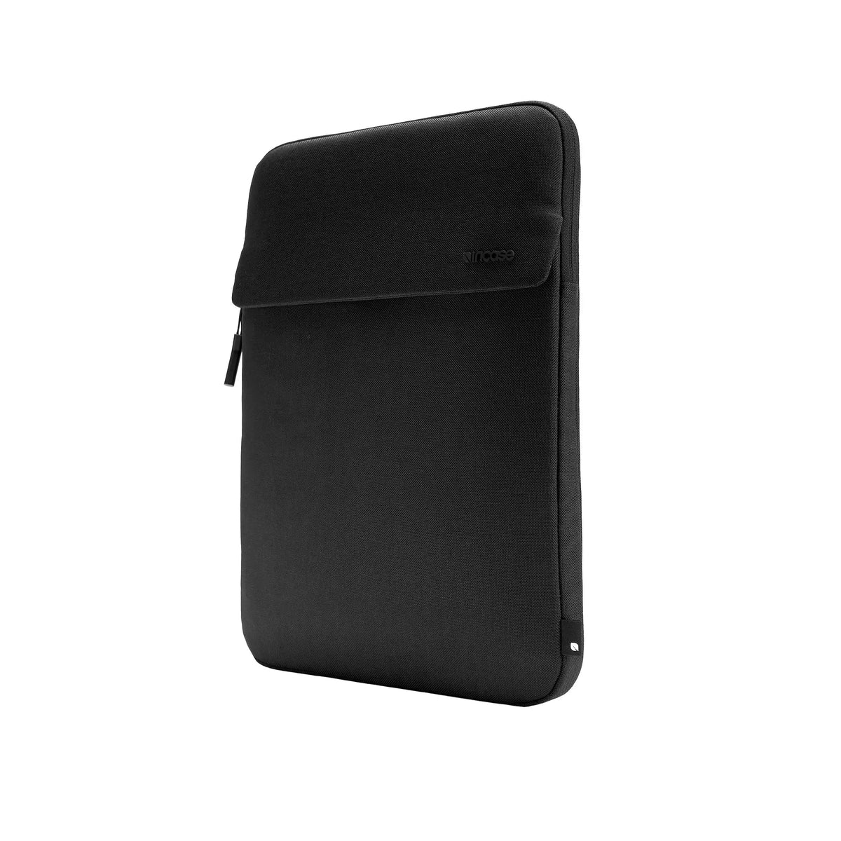 Incase Crosstown Sleeve for 16-inch laptops in Black, standing upright at a three-quarter angle on a plain white background
