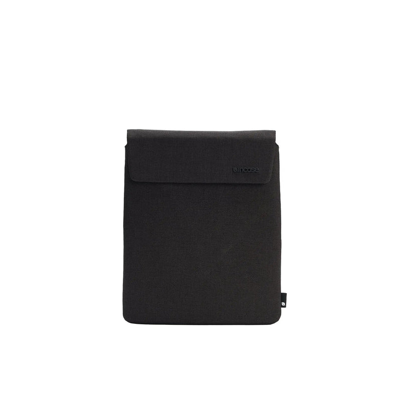 Front of the black Crosstown tablet sleeve showing the magnetic flap pocket, on a plain white background