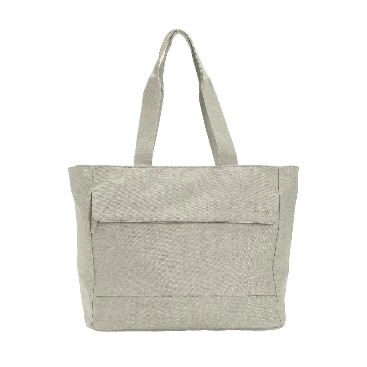 Incase Crosstown Tote in Limestone, a light beige-grey, front view on a plain white background with handles up